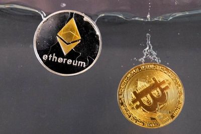 Ether falls to seven-week low; offshoot token tumbles by half