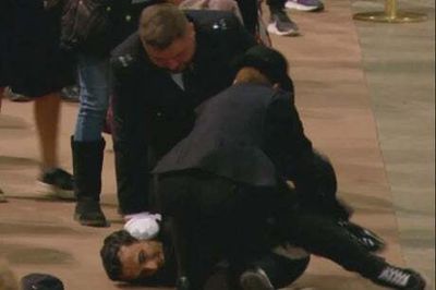 Man arrested after ‘rushing towards Queen’s coffin and lifting up flag’