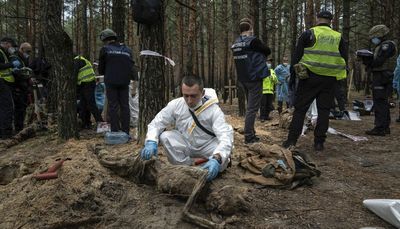 Mass grave is evidence of the horrific price Ukraine is paying as it fights for freedom