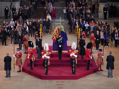 Queen queue – live: King Charles greets well-wishers as paramedics treat 700 mourners