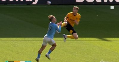 Wolves defender sent off after shocking challenge on Man City star Jack Grealish