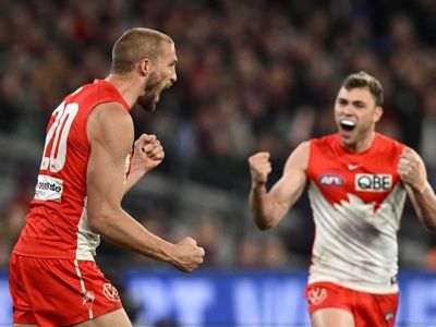 Swans' Reid joins Cats' Holmes in GF doubt