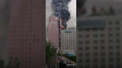 Fire engulfs skyscraper in southern China