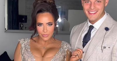 Steph Davis stuns in an art-deco gown with a plunging neckline at award ceremony