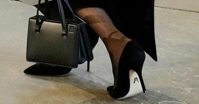 Meghan Markle wears shoes with mysterious symbol while paying respects to the Queen