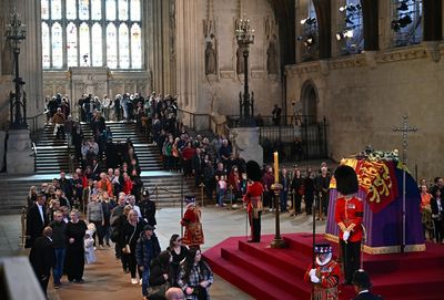 Women assaulted waiting to view queen