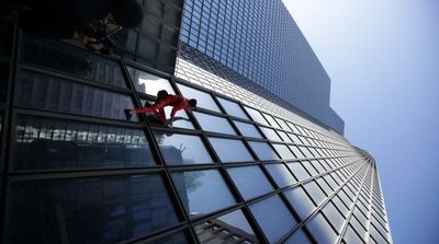 ‘French Spiderman’ Climbs Paris Skyscraper to Mark Turning 60