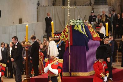 Prince William and Harry lead Queen’s grandchildren in silent vigil by her coffin