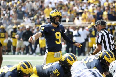 Michigan Uses Eight Quarterbacks in Blowout Win Over UConn