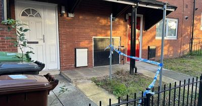 Neighbours leave touching tributes outside flat after mum and son, 10, found dead