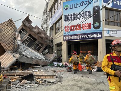 Strong Taiwan earthquake traps people and derails a train