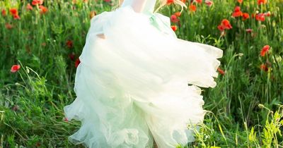 Woman lets son wear her wedding dress to school to protest his friend's suspension