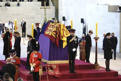 All of Queen Elizabeth II's grandchildren hold a silent vigil by her coffin