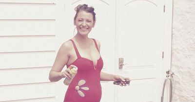 Blake Lively shows off her growing baby bump as she asks photographers to 'leave her alone'