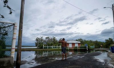Flooding and landslides in Puerto Rico after Hurricane Fiona knocks out power to island