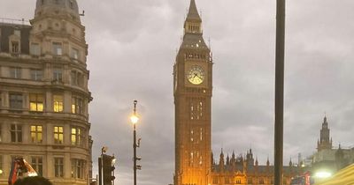 Crowds cheer for the Queen next to Big Ben after minute's silence