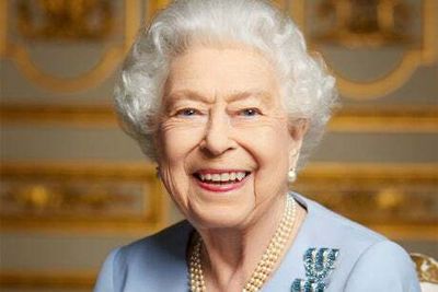 Queen’s ‘wonderful’ blue eyes sparkle in previously-unseen portrait issued before her funeral