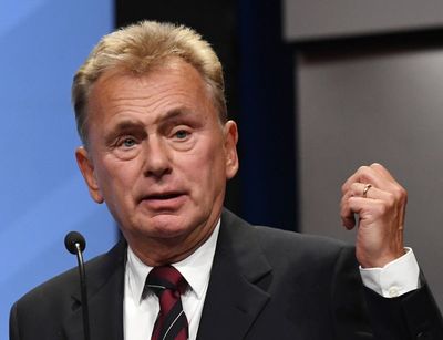 Anger as Wheel of Fortune host Pat Sajak takes photo with Marjorie Taylor Greene