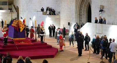 Biden, VIPs lay low as spotlight stays on late Queen