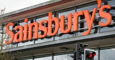 Piles of clothes for recycling left strewn across Sainsbury's car park