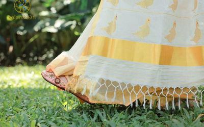 Kuthampilly weavers recreate the famed parrot motif of the Kalakshetra sari on the Kerala Kasavu