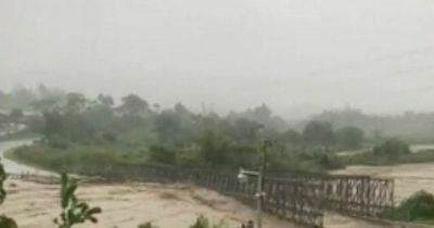 Hurricane Fiona slams Puerto Rico as footage shows entire BRIDGE being washed away