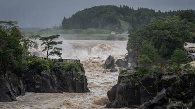 Typhoon Batters Japan with Record Rain, Killing One