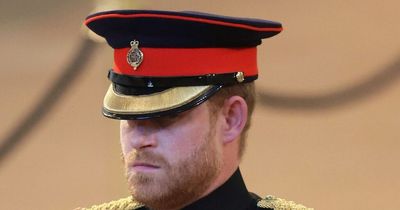 Why is Prince Harry not wearing his uniform at the Queen's funeral?