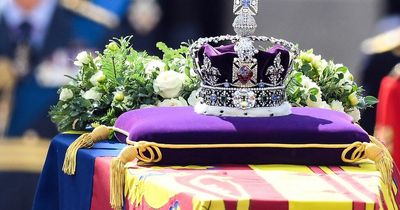 Who is walking behind the Queen's coffin during the funeral procession