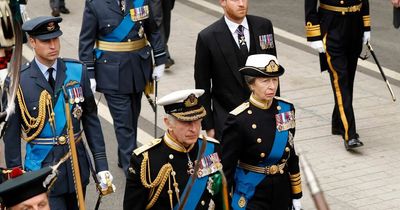 King Charles, William and Harry united in grief as they march behind Queen's coffin