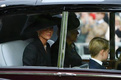 Kate Middleton wears tailored black coat and hat with veil to the Queen’s funeral