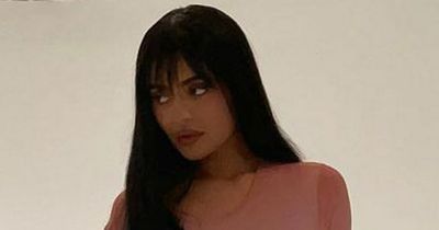 Kylie Jenner mistaken for Angelia Jolie as she debuts blunt baby bangs and huge pout