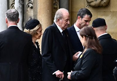 Ex-King Juan Carlos' attendance at queen's funeral draws scorn from Spanish left