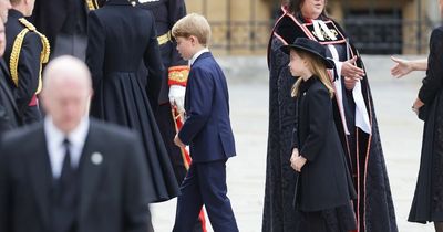 Break with tradition for Prince George as he walks behind Queen's coffin