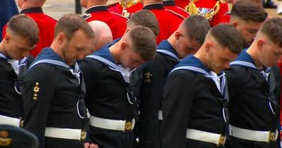 Touching moment 'emotional' sailor steps out of line as Queen embarks on final journey