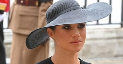 Meghan Markle looks sombre as she enters Westminster Abbey behind Kate Middleton