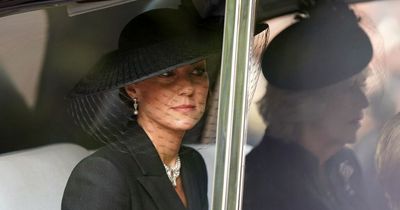 Princess of Wales' nod to the Queen as she holds hands with daughter at state funeral while Meghan Markle also pays tribute