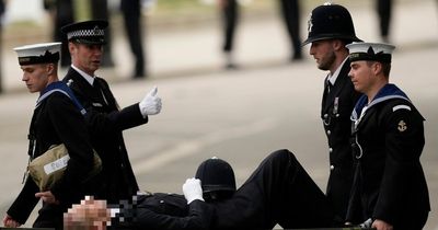 Police officer stretchered away after collapsing outside Westminster Abbey