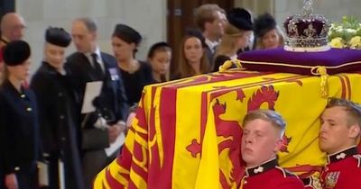 What is the flag on top of the Queen’s coffin?