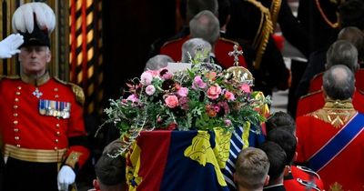Huw Edwards reveals what the card on top of the Queen's coffin actually said