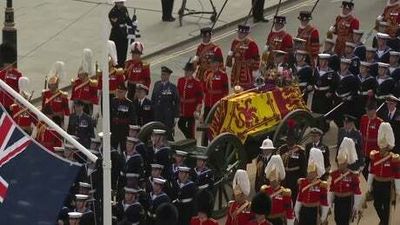 King Charles and siblings follow Queen's coffin in procession