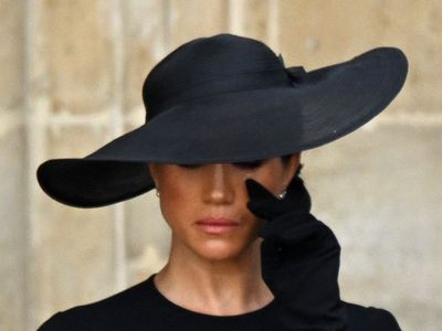 Meghan Markle wipes away tears during Queen’s funeral