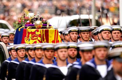 Hundreds gather to watch state funeral as Queen’s service to nation praised