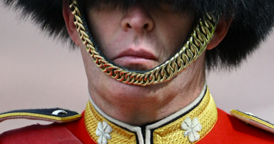 The reason British guards wear their helmet straps under their lips not their chin