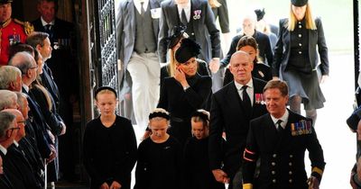 Solemn Zara and Mike Tindall wear black with daughters as they arrive at Queen's funeral