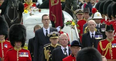 Queen's 'favourite' courtier 'Tall Paul' joins procession after funeral