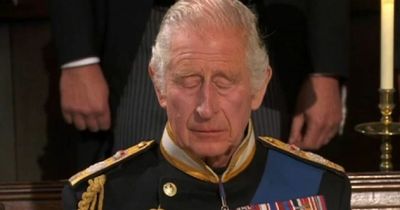 King Charles in tears as Queen's coffin is lowered into vault and mourners sing God Save The King