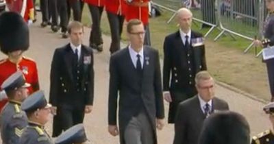 Who was that tall man in Queen's funeral procession today?