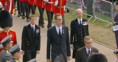 Queen's servant Matthew Magee stuns mourners as 7ft2 secretary walks with coffin