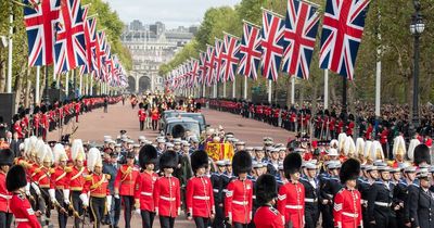 Tears, singing and applause on emotional day of Queen's funeral